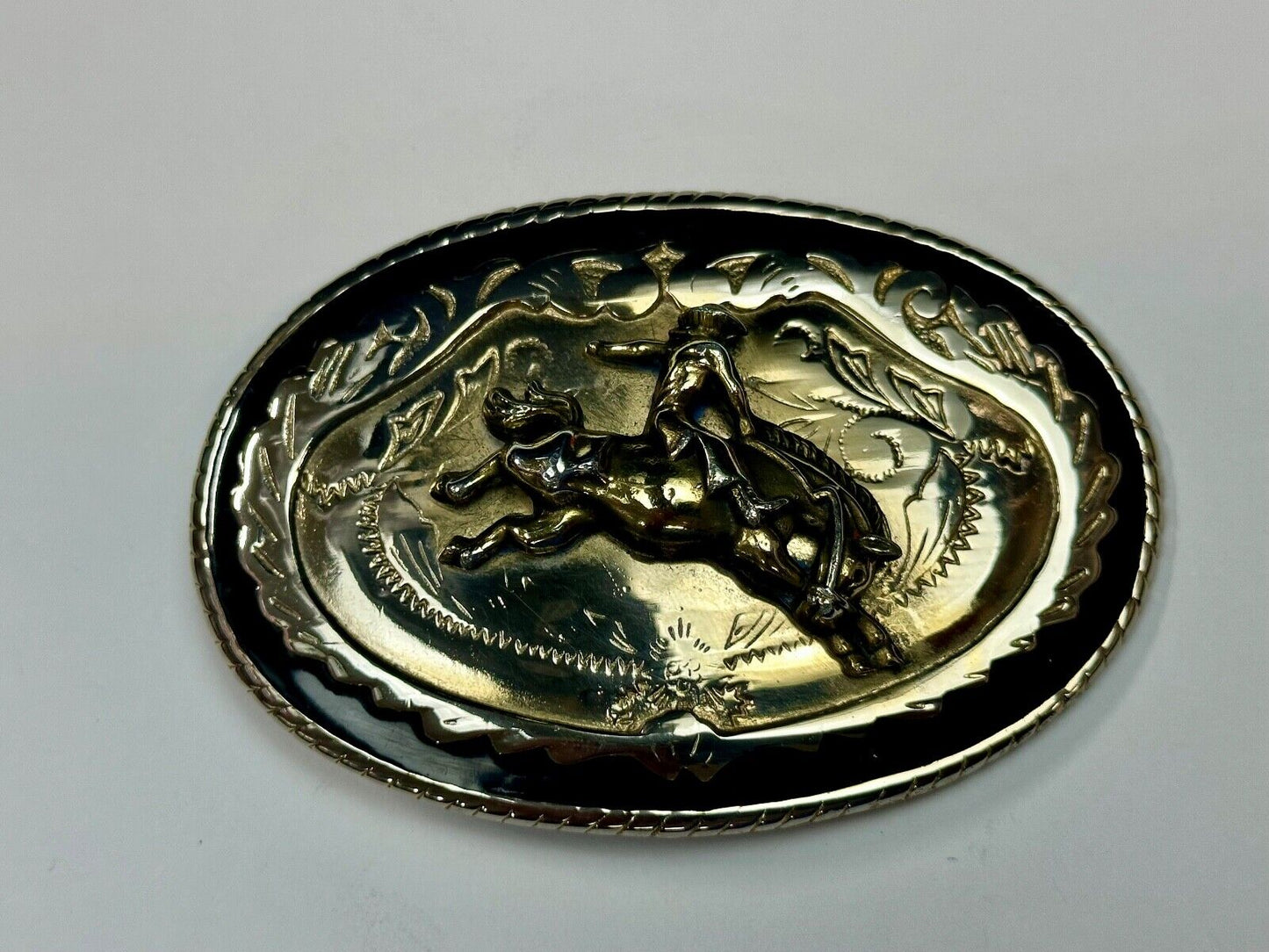 Beautiful Cowboy Saddle Bronc western black silver gold color belt buckle