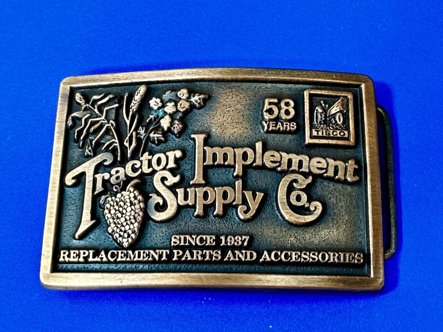 TISCO 58 Years Tractor Implement Supply Co. Since 1937 Belt Buckle by Spec-Cast