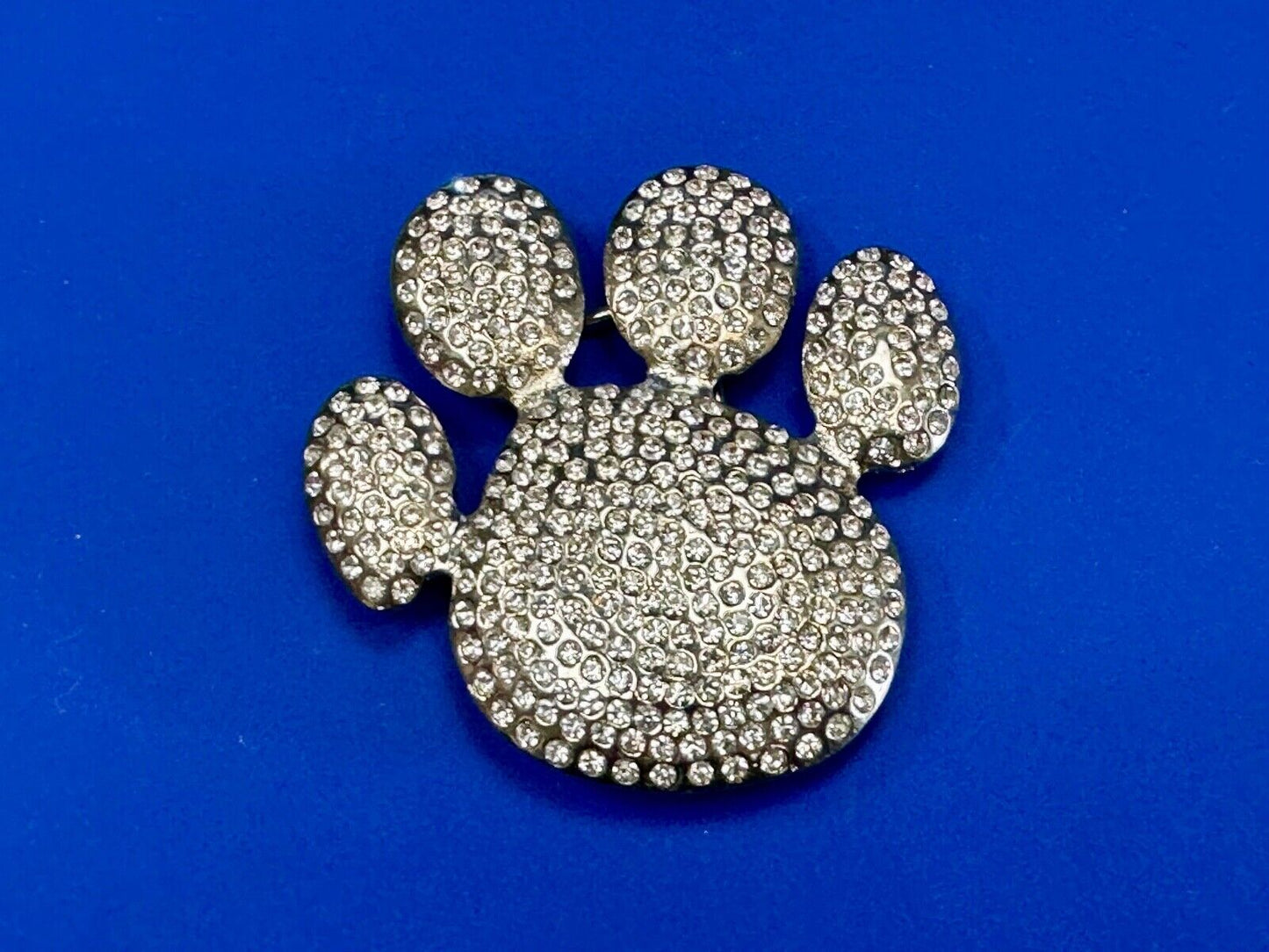 Bear Paw Print Silver Tone rhinestone covered belt buckle