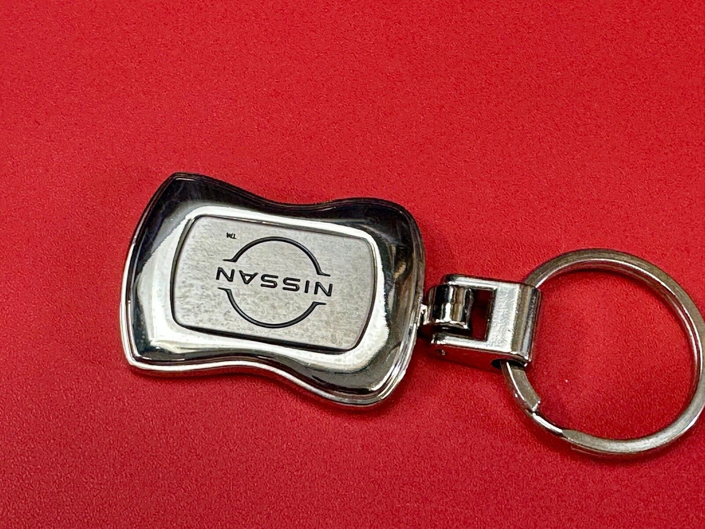 Sutherlin Nissan of Florida car truck dealers logo emblem Keychain - Key Ring