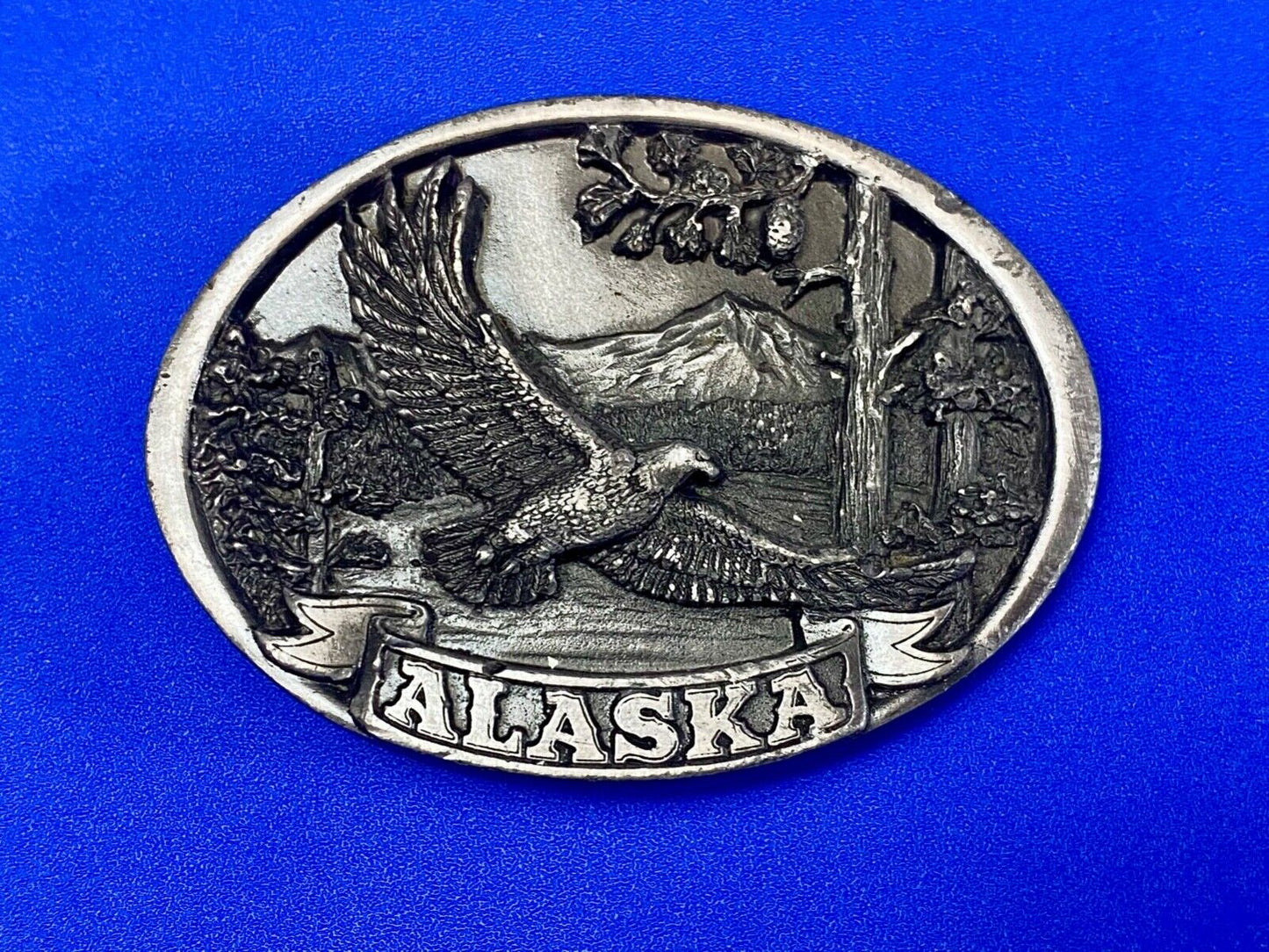 Vintage 1986 Eagle flying high over mountains Alaska belt buckle by C+-J