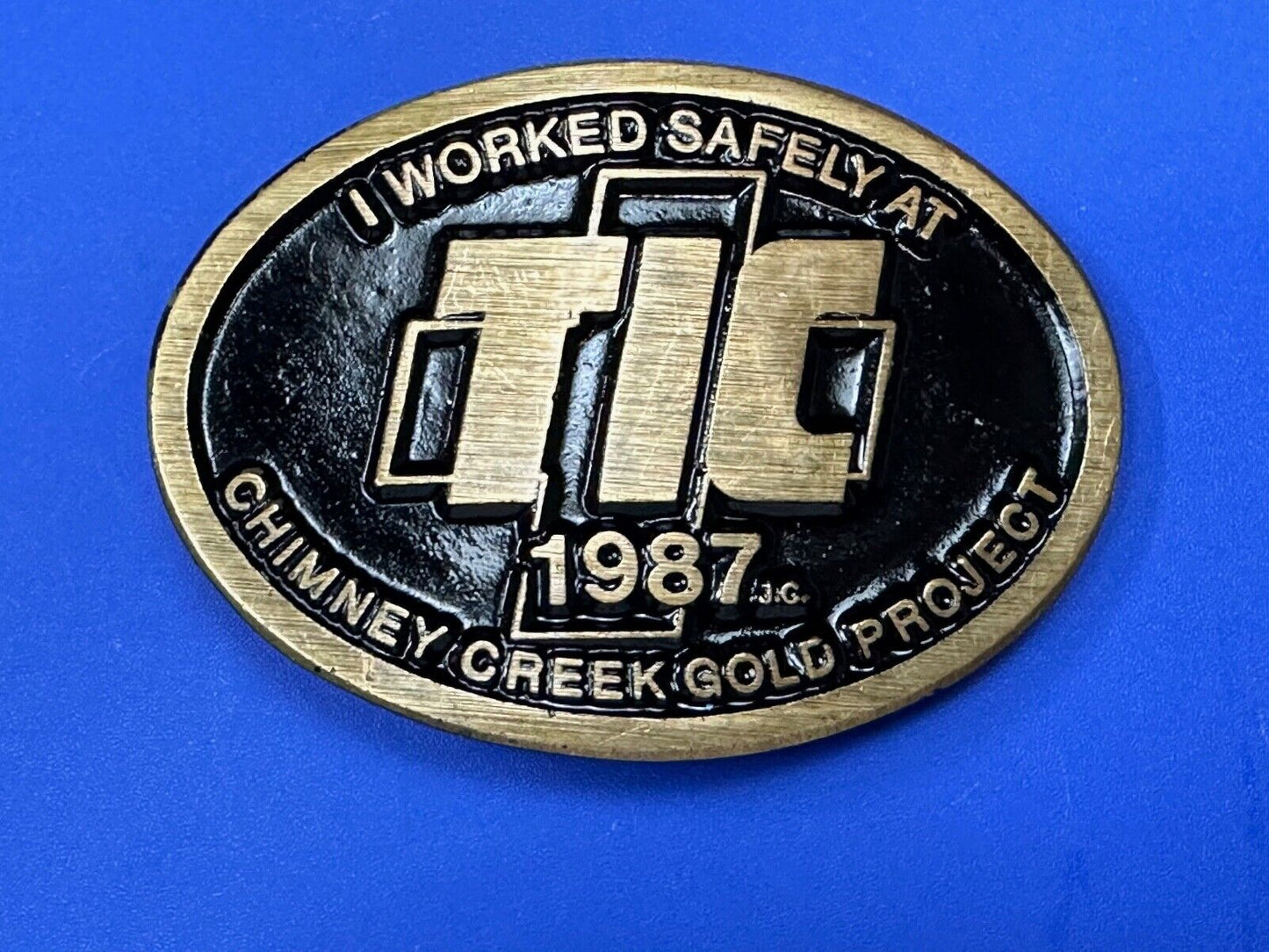 Vintage 1987 TIC Chimney Creek Gold Project Safety award brass belt buckle