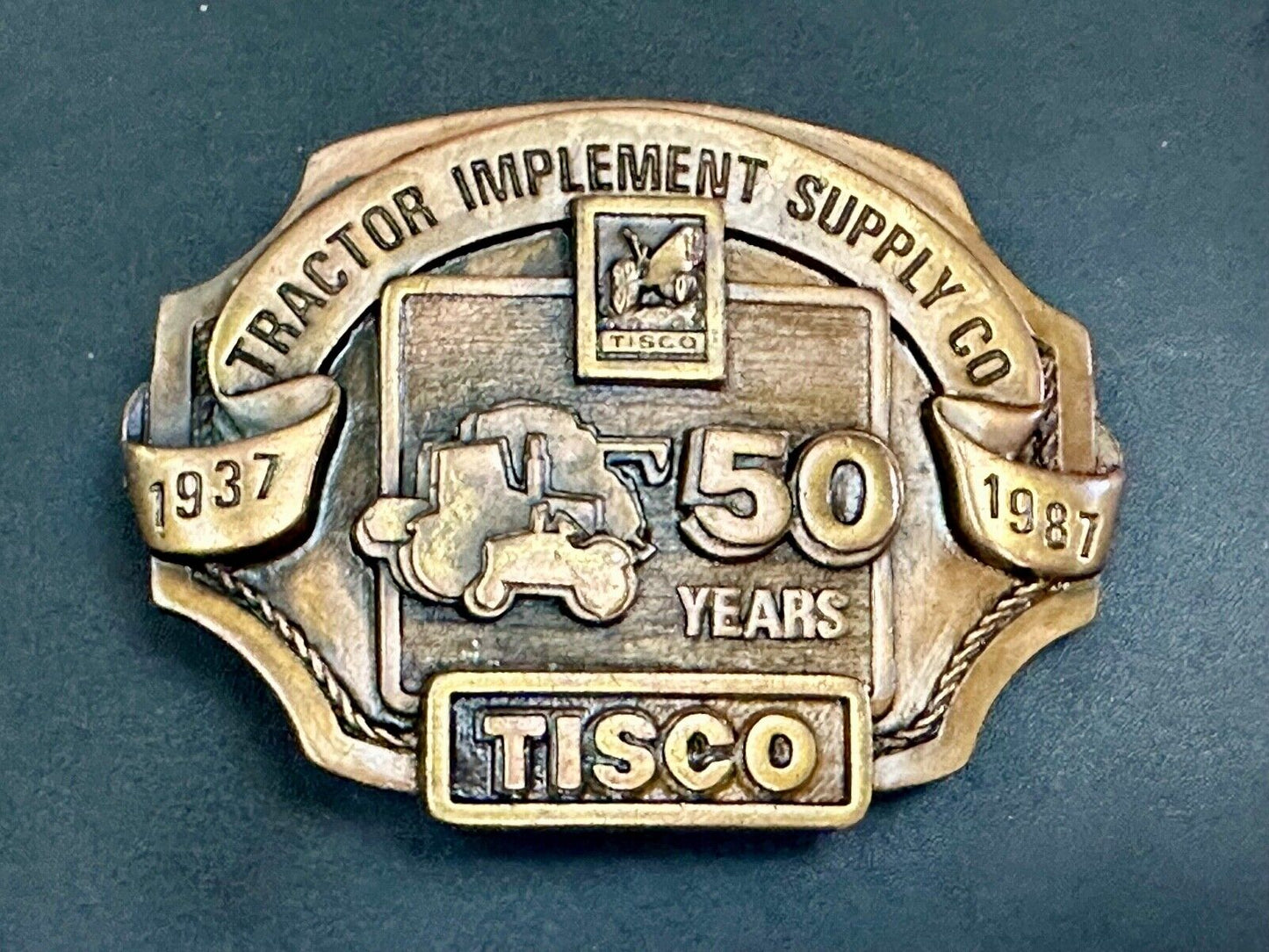Tisco 50 year celebration Tractor farm supply company promo 1986 belt buckle