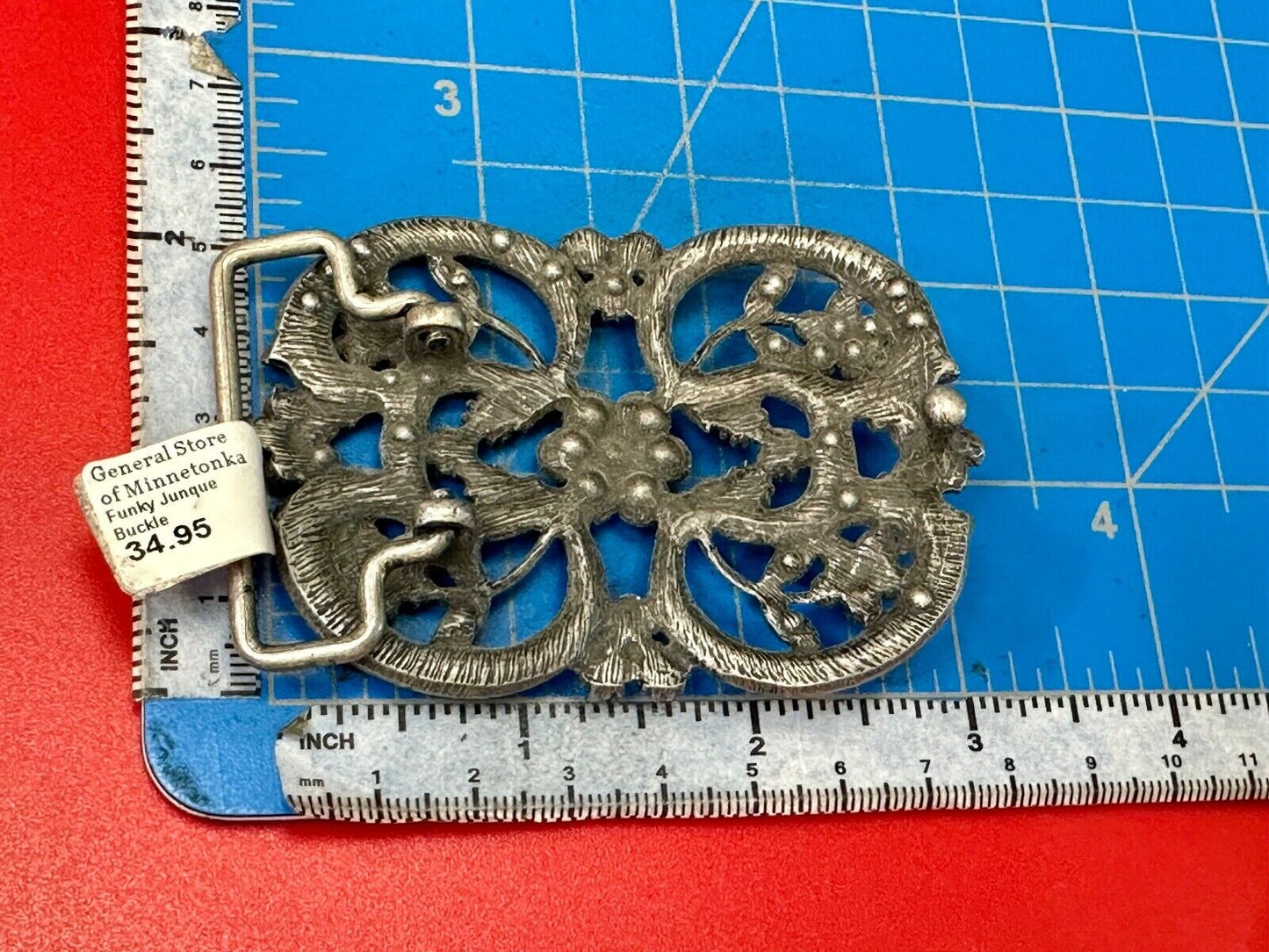 Black rhinestone accented metal flower pattern NOS Funky Junque belt buckle