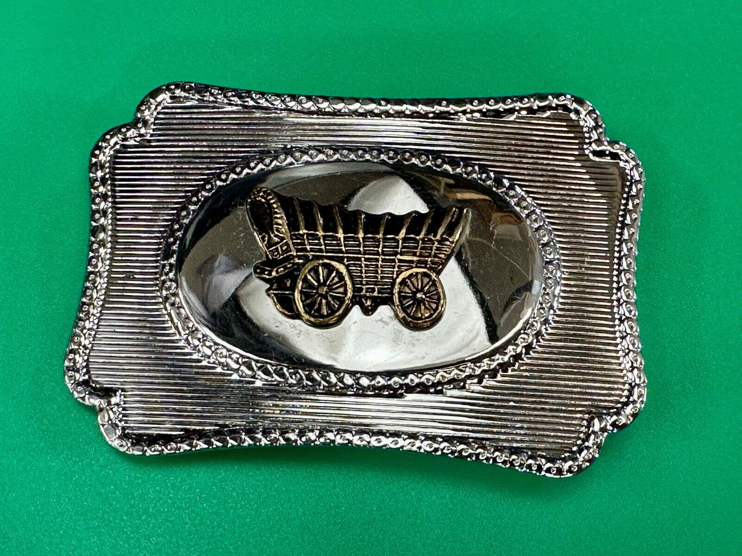 Vintage Covered Wagon - western two tone outlined belt buckle