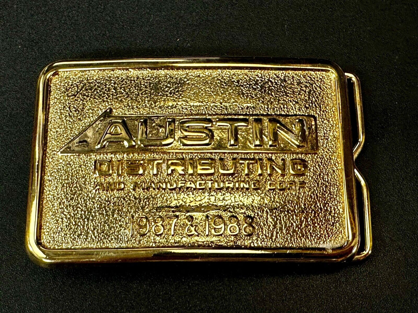 Austin Texas Distributing and Manufacturing 1987 - 1988 Gold Tone Belt Buckle