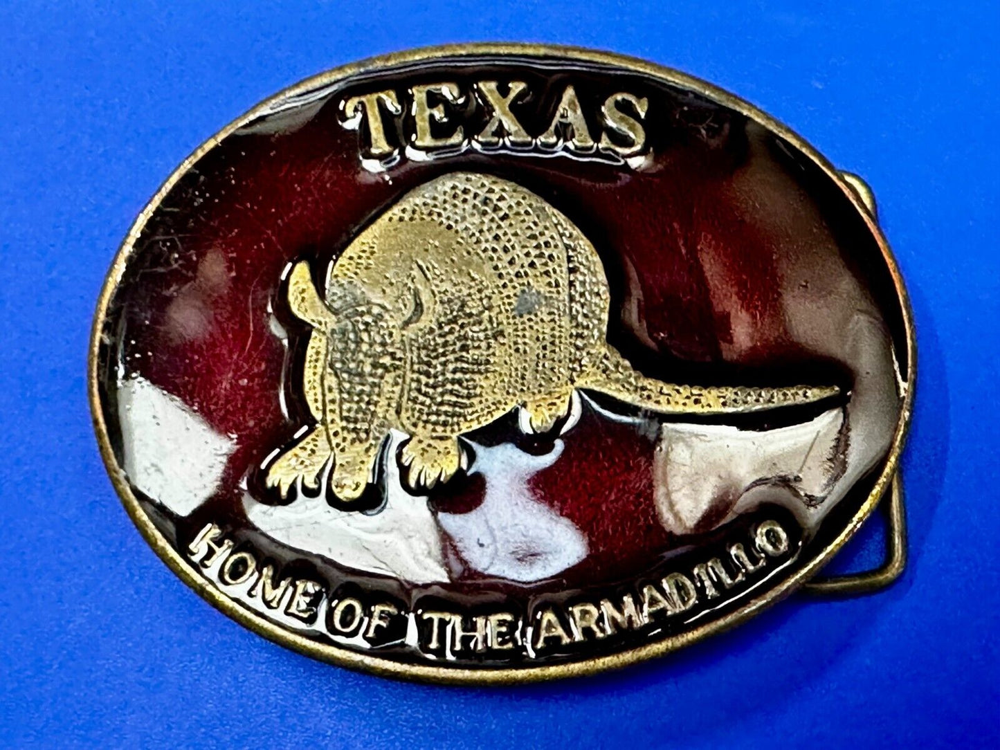 Texas Home of the Armadillo Commemorative Red colored Belt Buckle by Koleaco