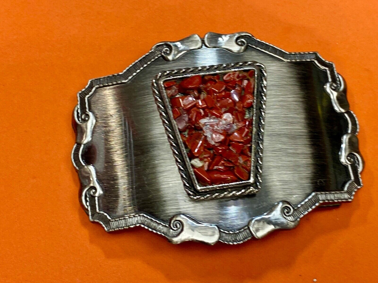 Vintage chunky red stones in centerpiece of Western Thick framed belt buckle