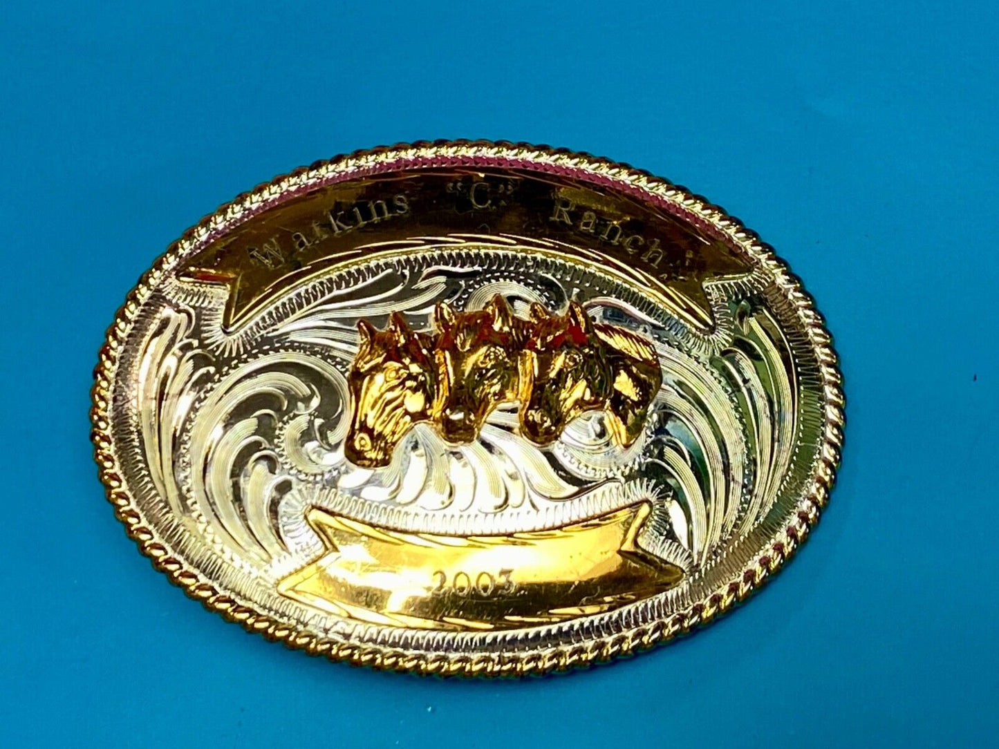 Three Horse heads silver tone? western belt buckle from Mexico- engraved ribbon