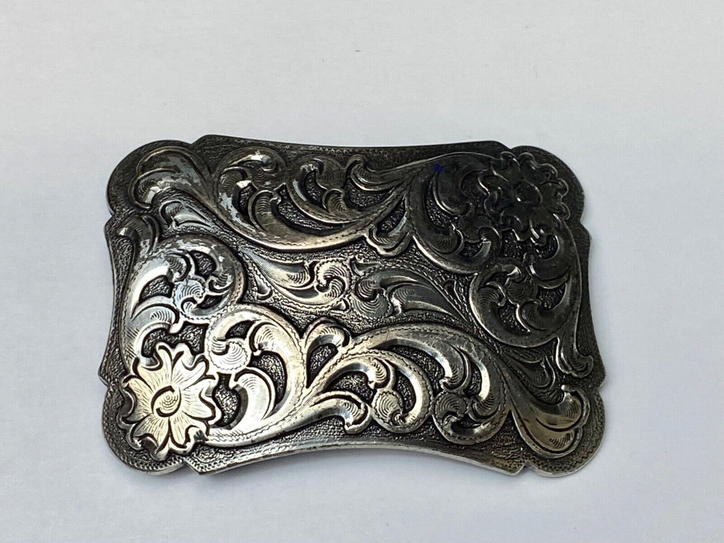Thick flower swirl silver color western belt buckle