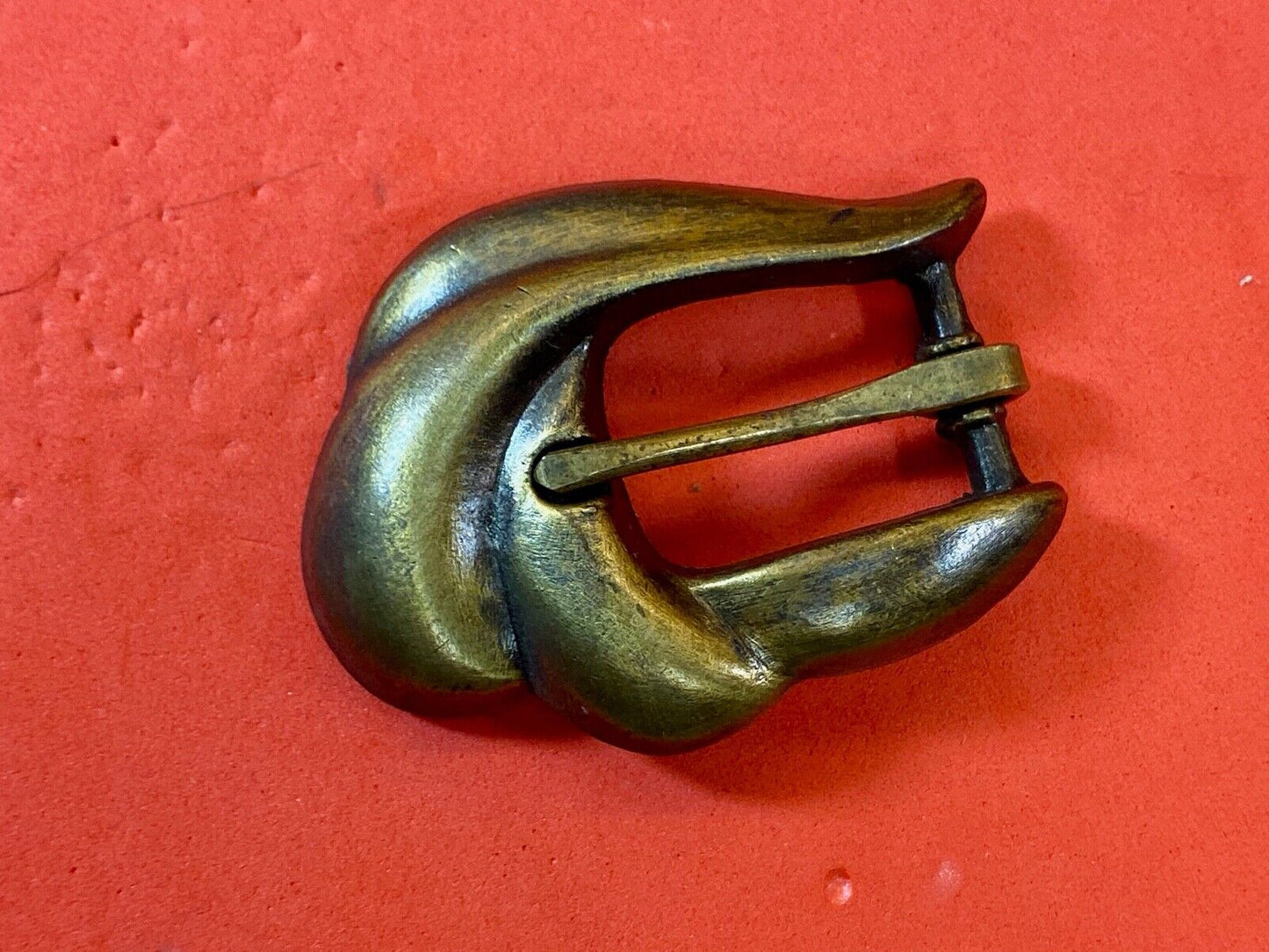 apple acc of New York stamped gold tone retro belt buckle