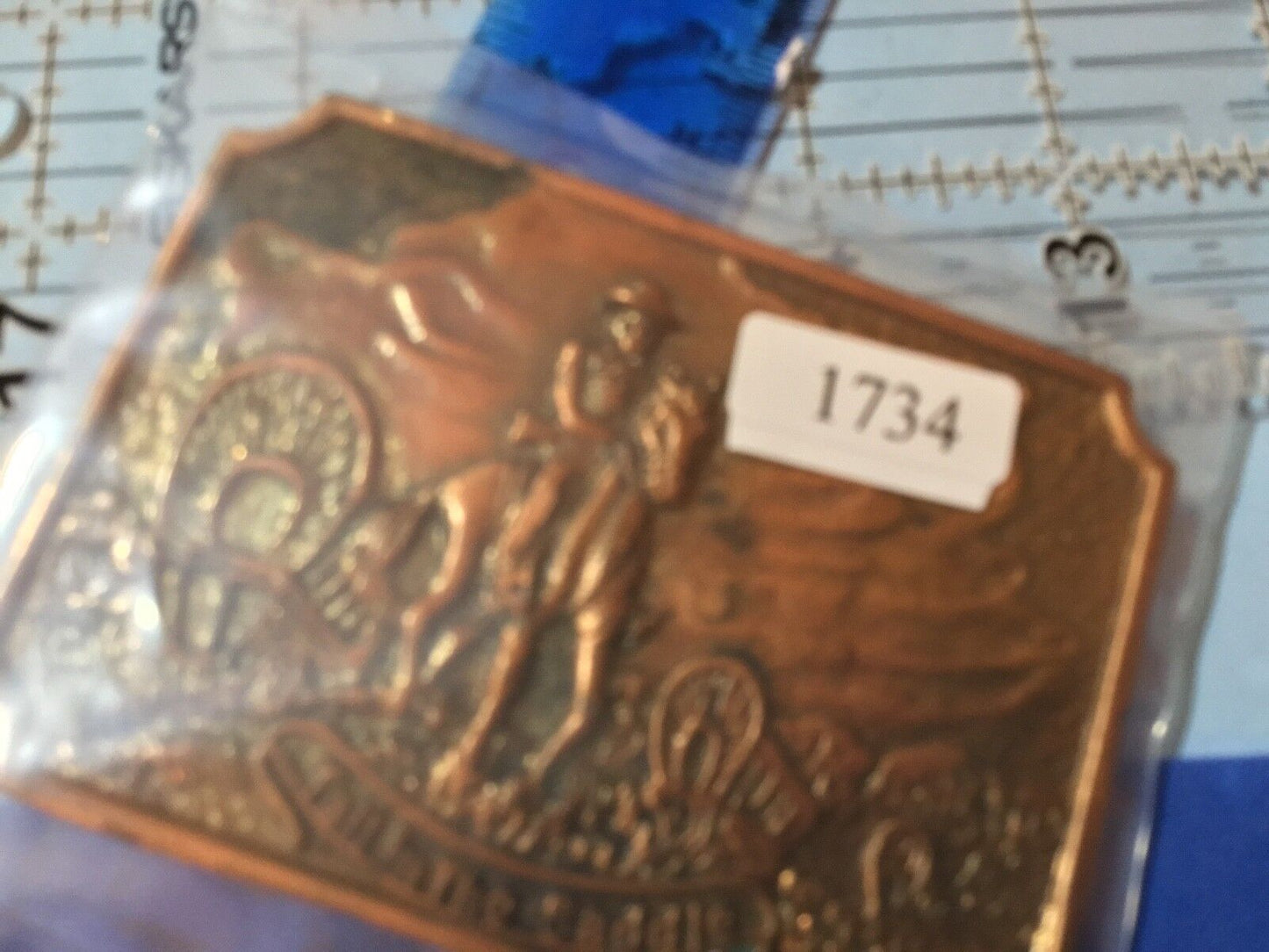 Tall in the saddle belt buckle - covered wagon - out west belt buckle