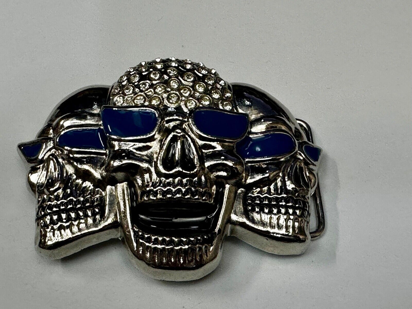 Three Skull's Heads Rhinestone Accented W/ Blue Shades Silver Tone Belt Buckle