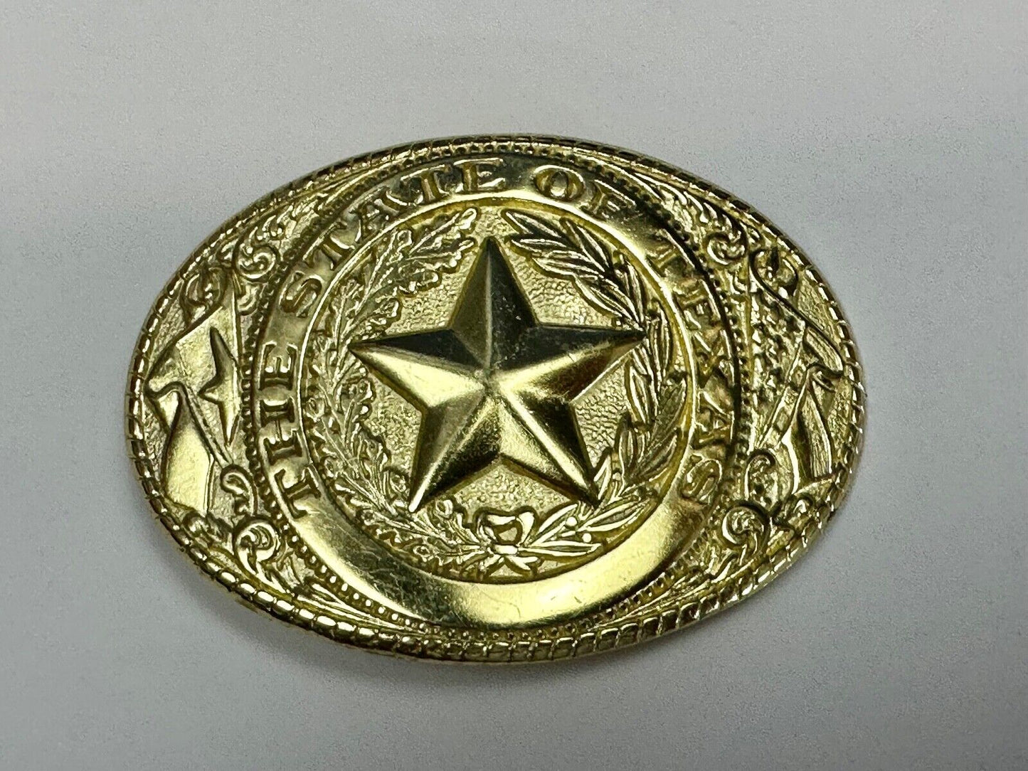 The Great State of Texas - Lone Star Flags seal gold & white color belt buckle