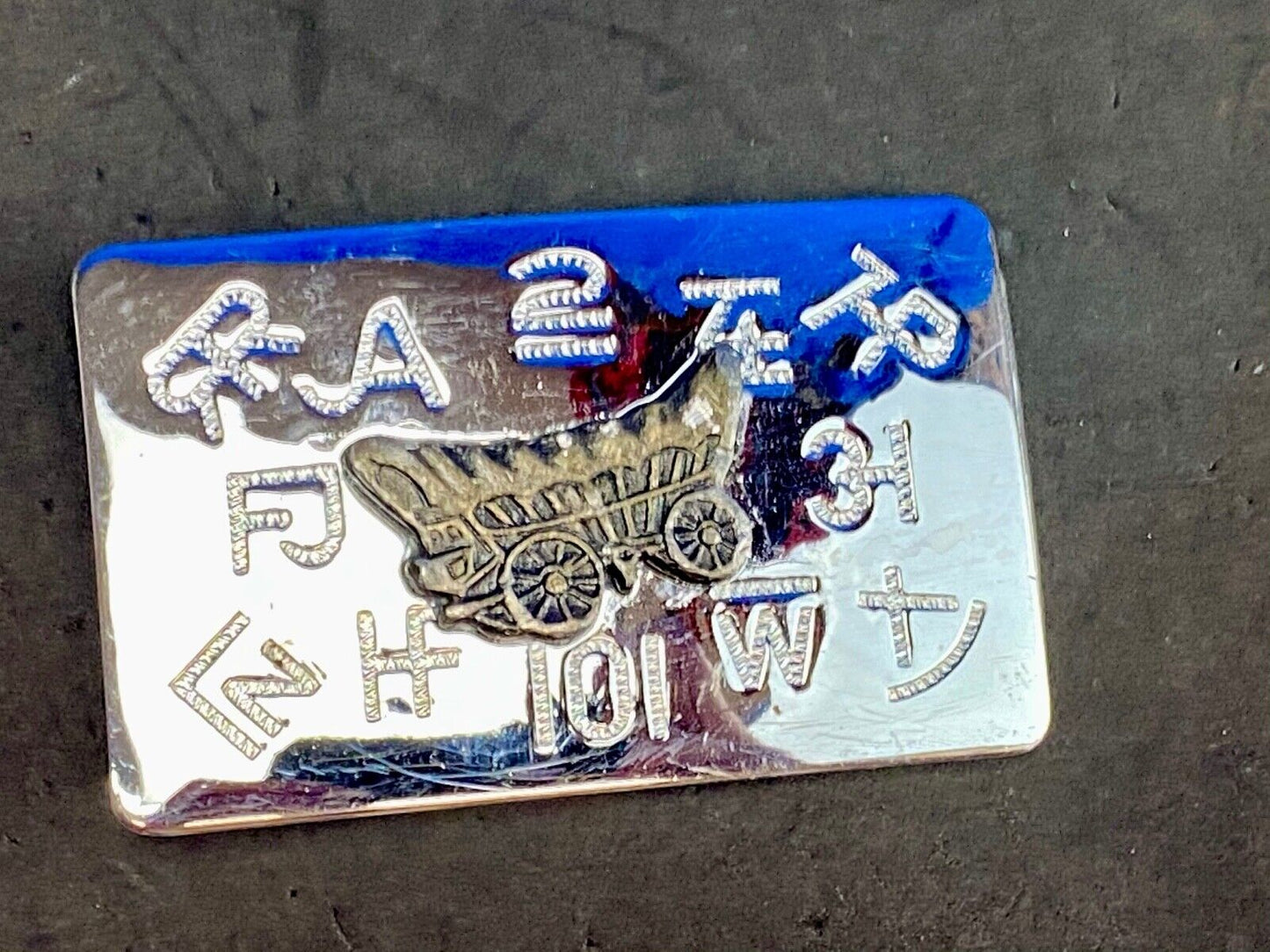 Vintage Chaimbers covered wagon western belt buckle with branding signs marks