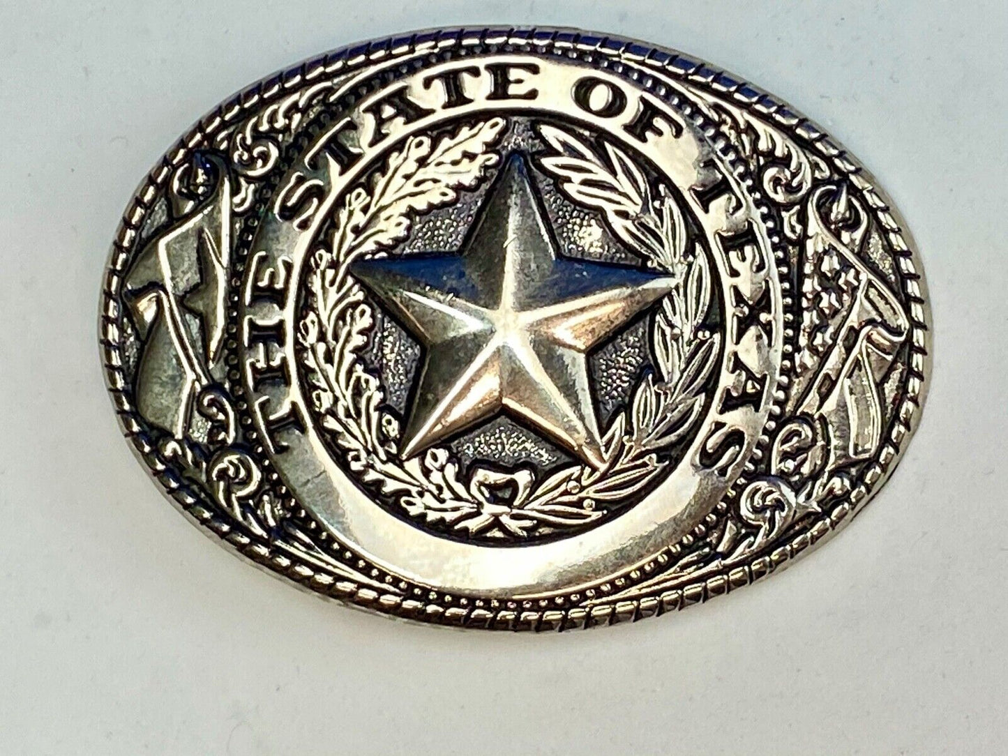 THE GREAT STATE OF TEXAS Star Black and Silver color flower swirl belt buckle