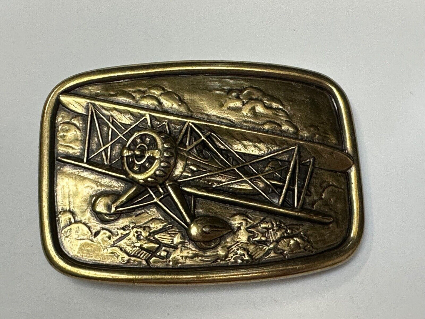 Bi-Plane Pilots Airplane brass tone Belt Buckle by Avon
