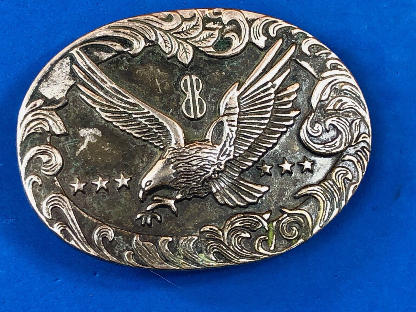 Vintage belt buckle of Flying Diving Hunting Eagle, Bird, Grouse, Stars