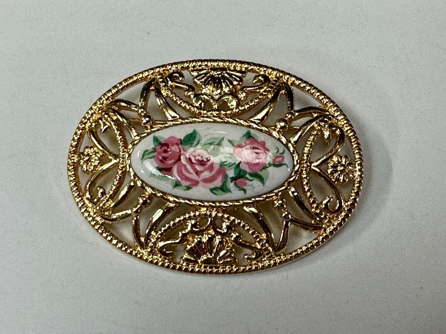 Avon signed gold tone see through surround Porcelain flower theme brooch pin