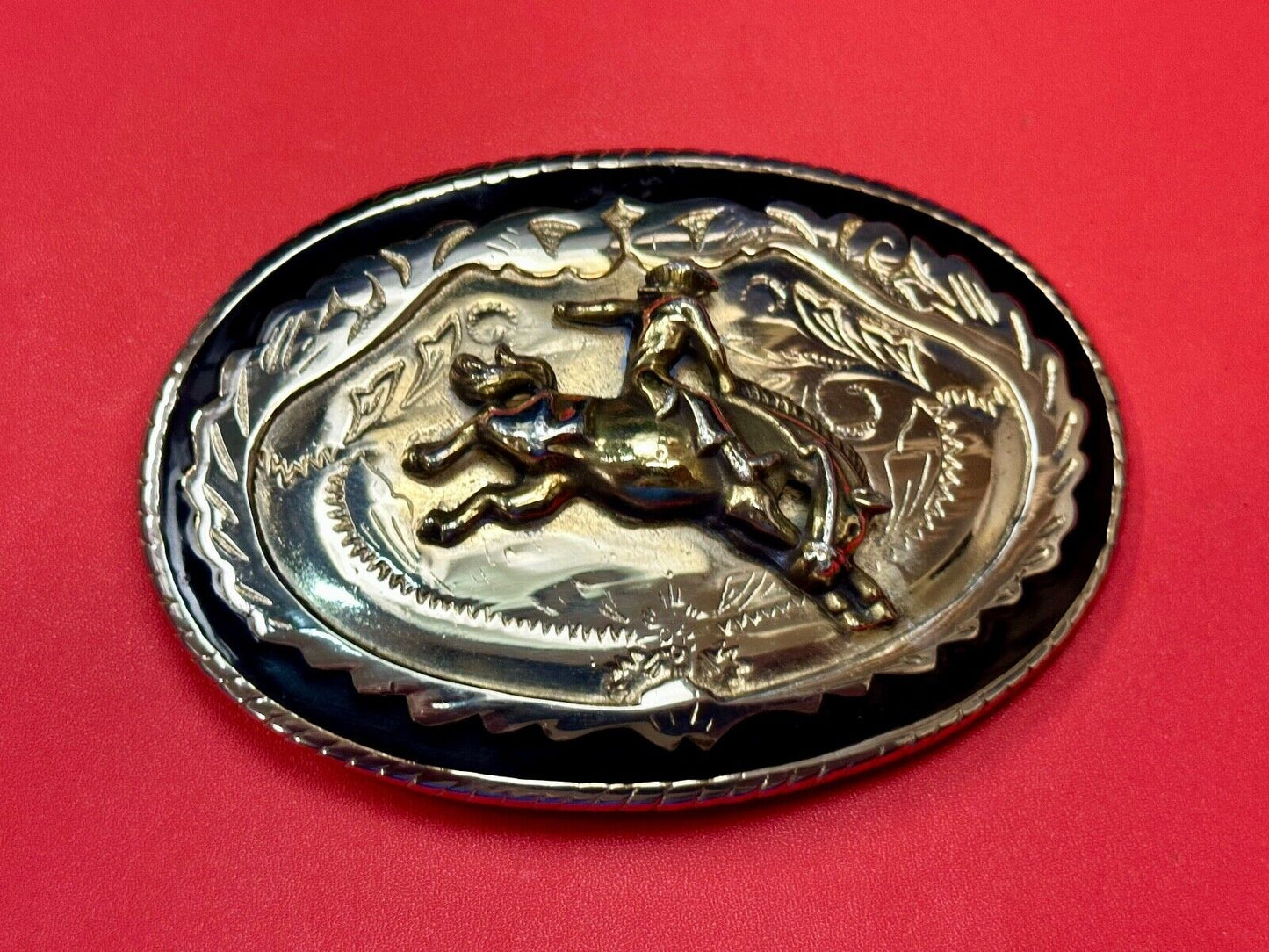 Beautiful Cowboy Saddle Bronc western black silver gold color belt buckle