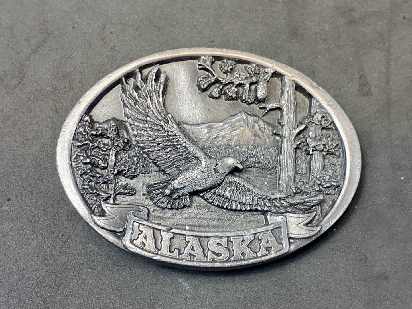 Vintage 1986 Eagle flying high over mountains Alaska belt buckle by C+-J