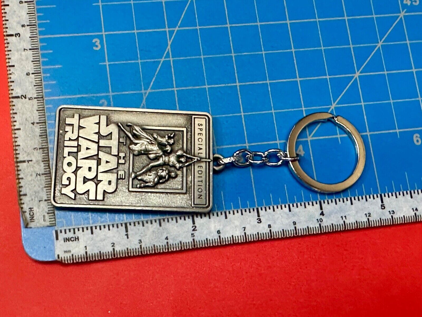 The Star Wars Trilogy Logo Emblem NOS Keychain!
