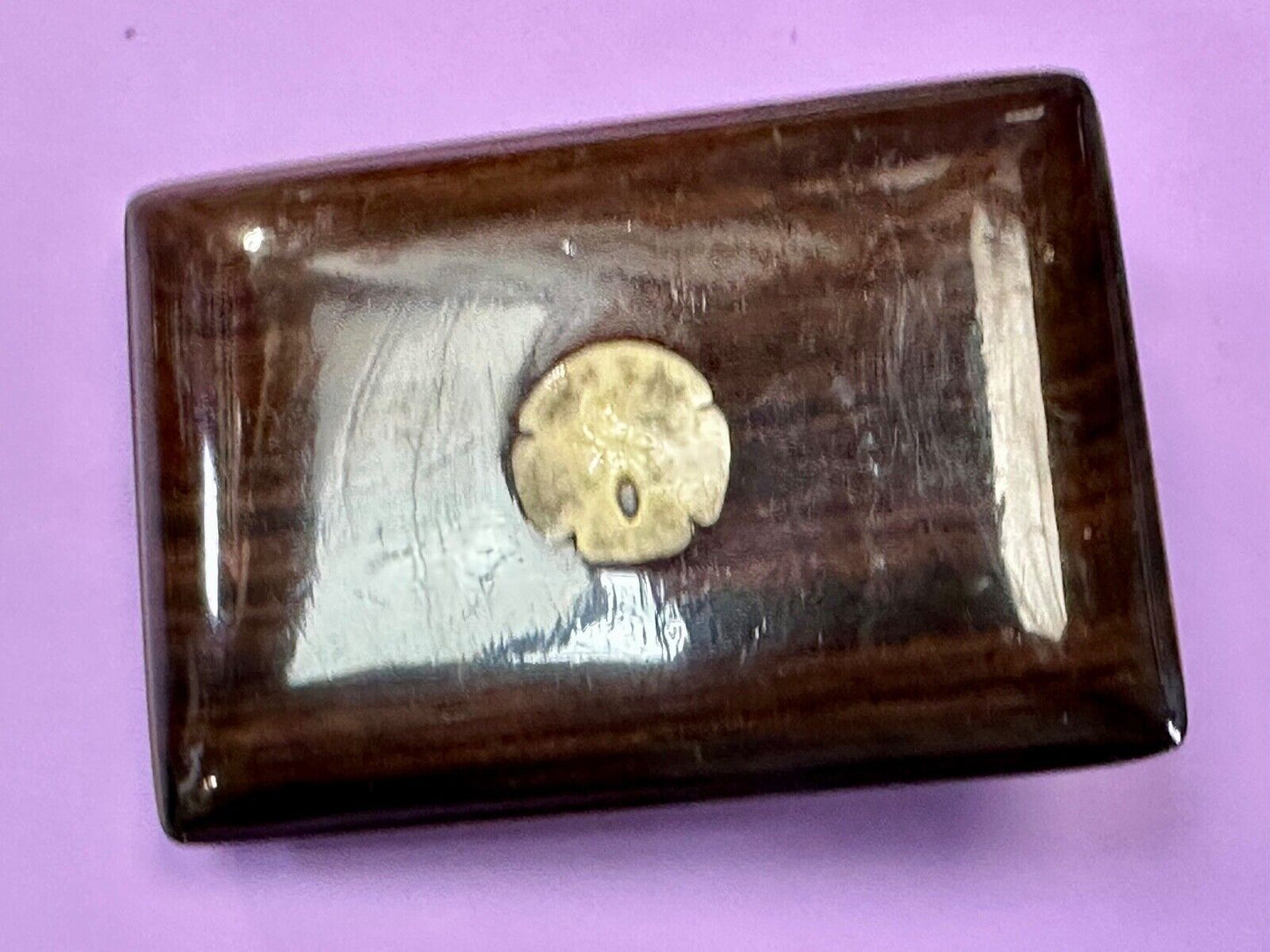 Artisan wood belt buckle with small inlaid sand dollar sea shell
