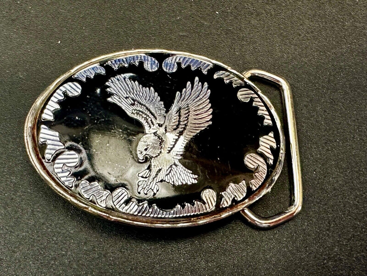 Black & silver tone Flying Eagle Oval Belt Buckle with "W" Mark. Made in U.S.A.