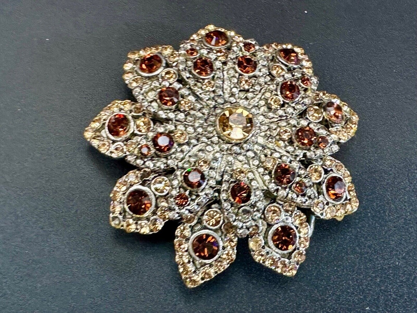 Beautiful rhinestone accented star shaped ornate belt buckle - missing stone