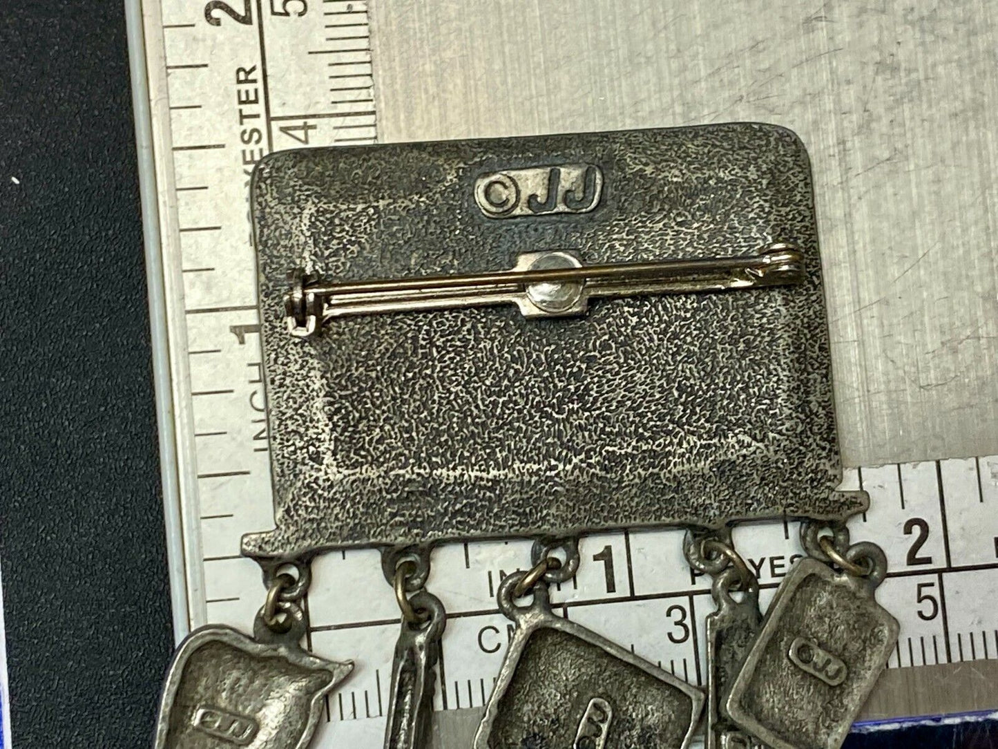 VINTAGE *J.J.*PEWTER MATH TEACHER CHALKBOARD BROOCH PIN W/THEMED FIGURAL DANGLES