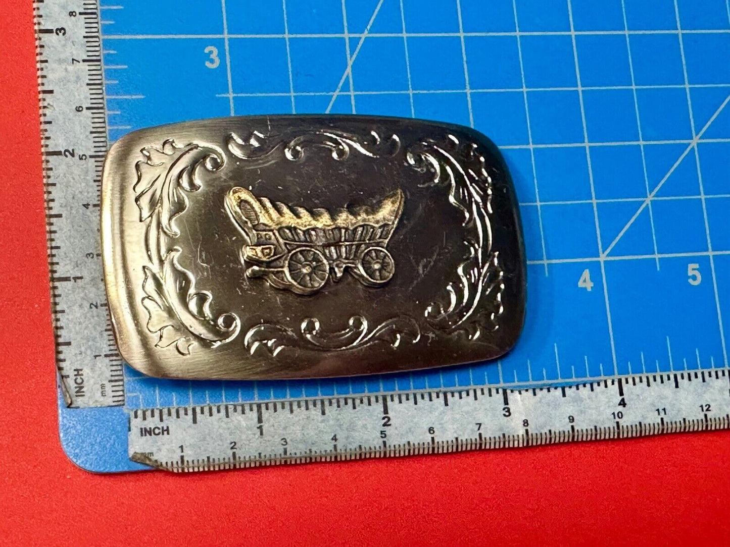 Vintage covered wagon two tone western mixed metal belt buckle