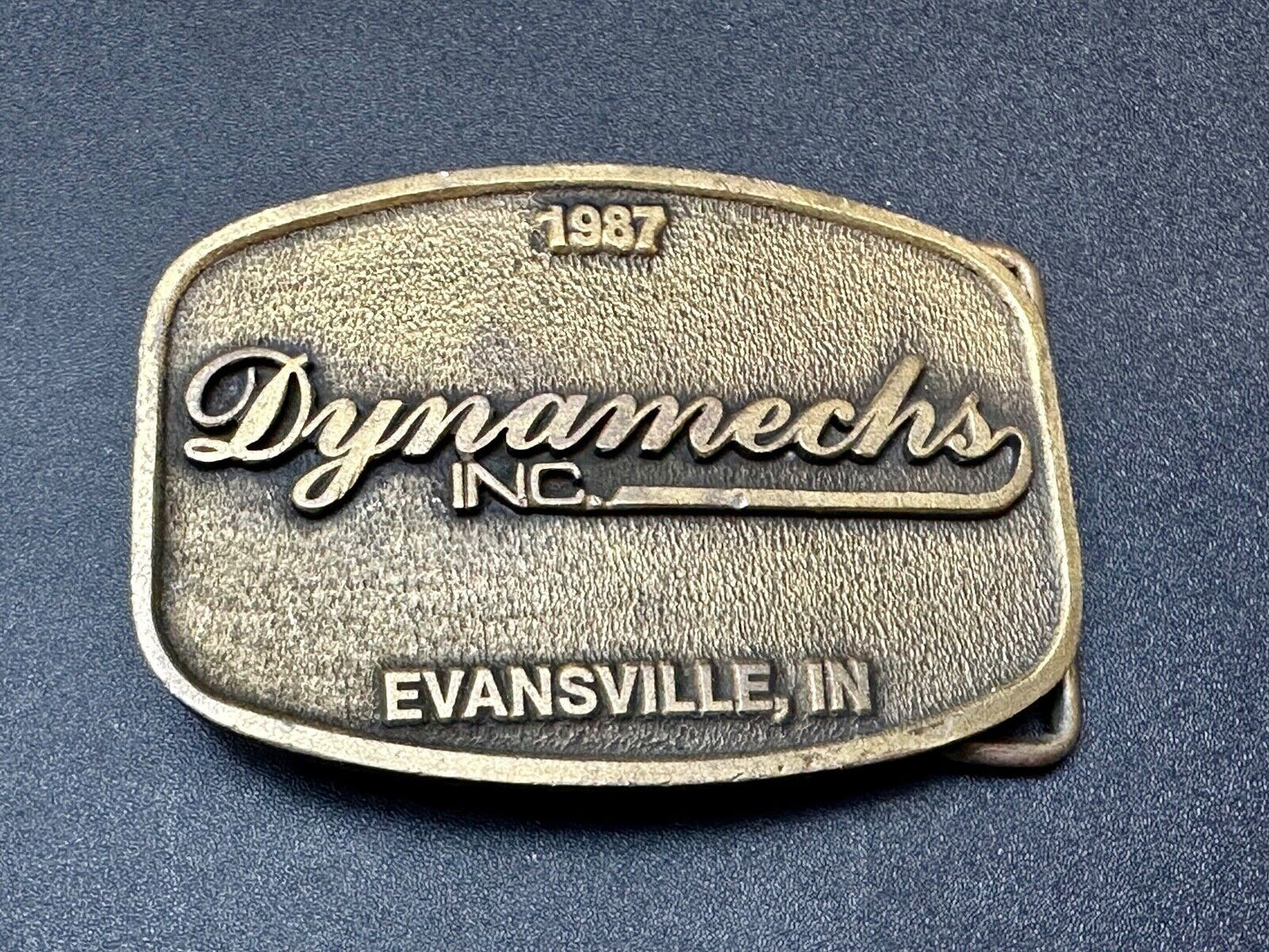 Vintage 1987 Dynamechs INC Evansville IN Truck Service belt buckle by CD Hit