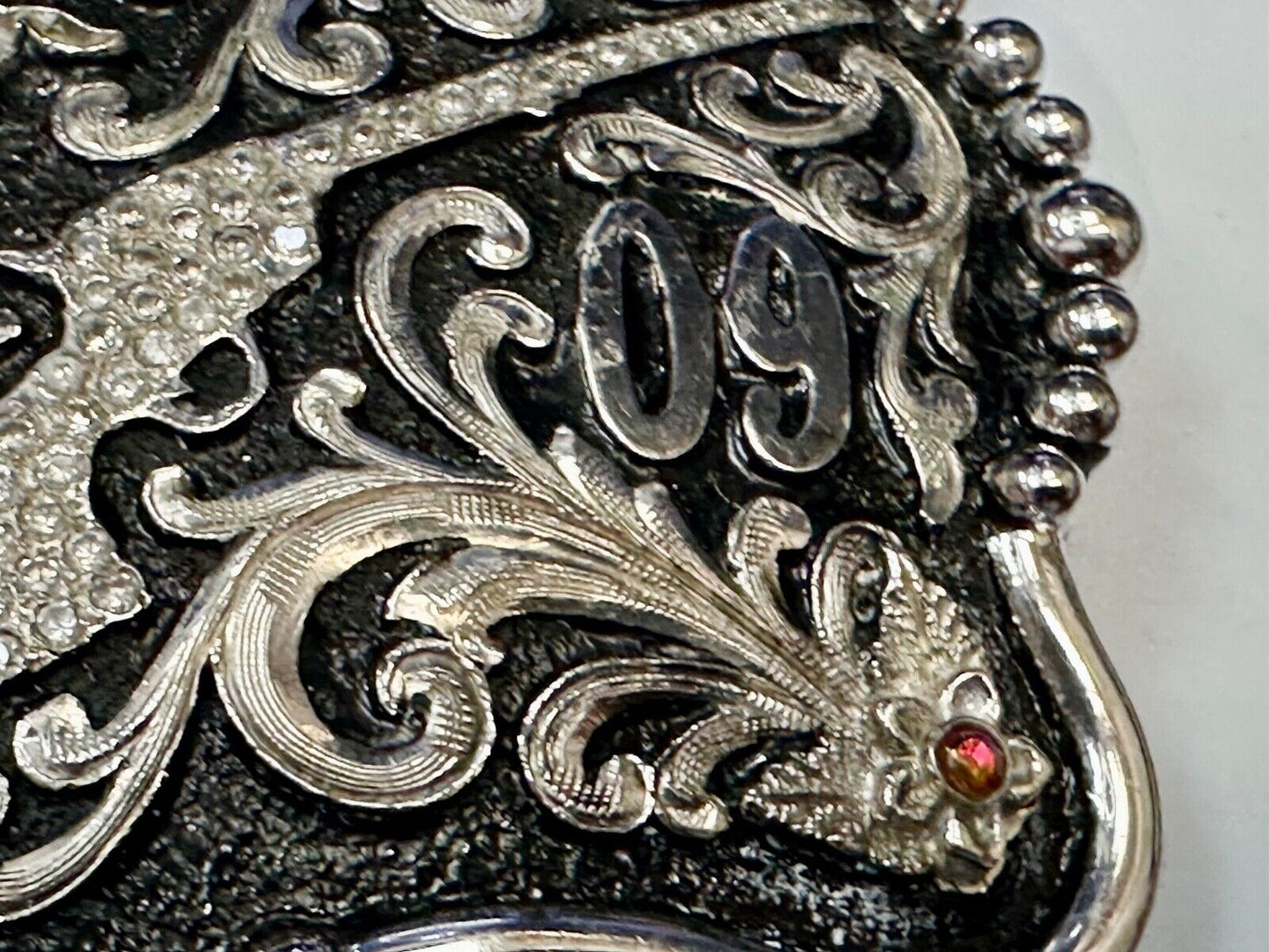 The Outlaws Rodeo Cowboy Trophy 2009 Flag Belt Buckle - Crossroads bucklesTexas