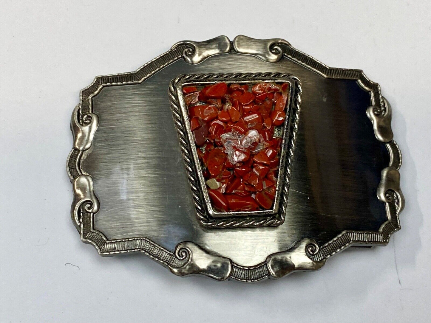 Vintage chunky red stones in centerpiece of Western Thick framed belt buckle