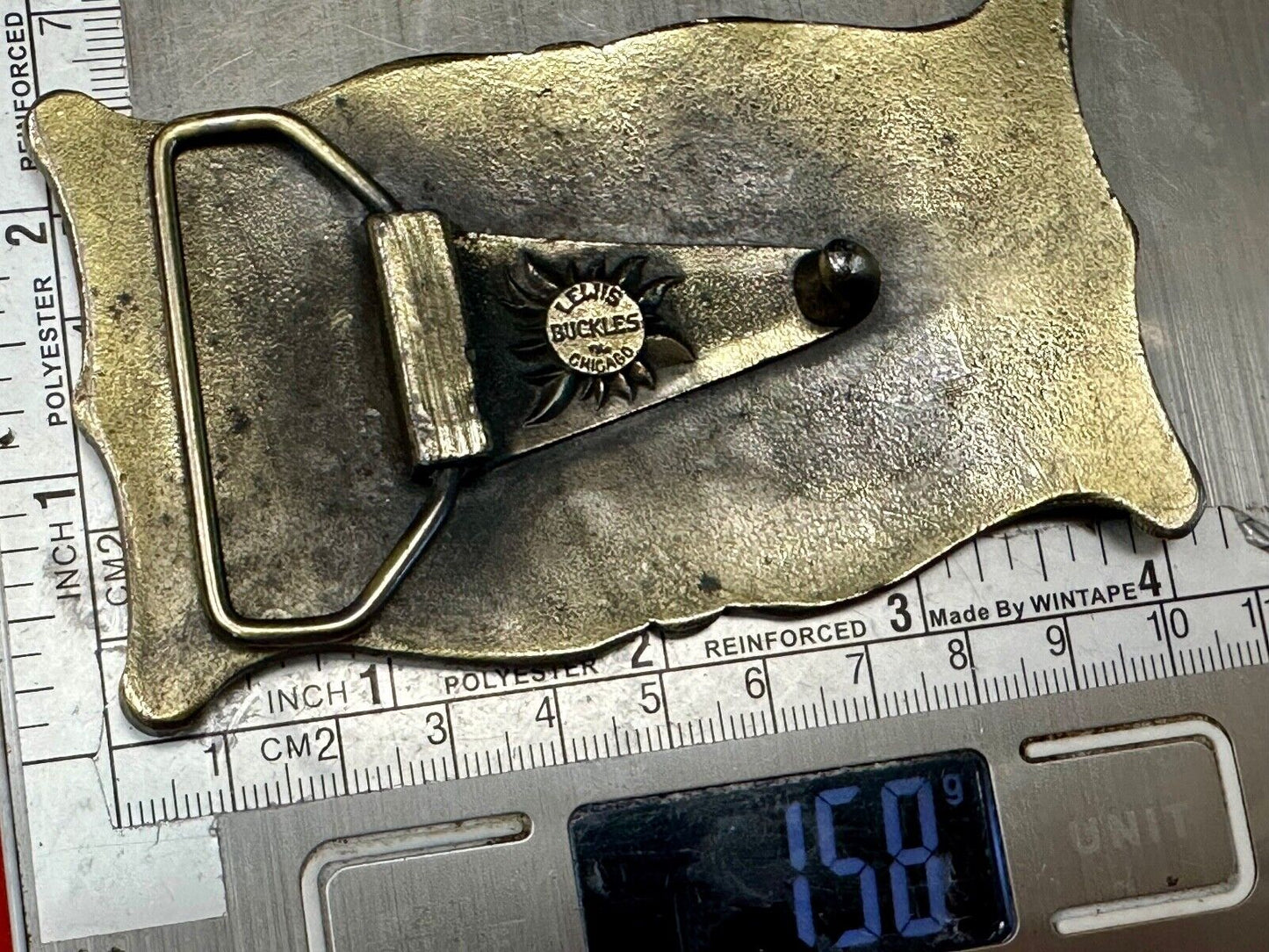 The Elgin, The worlds first tree sweeper commemorative belt buckle by Lewis