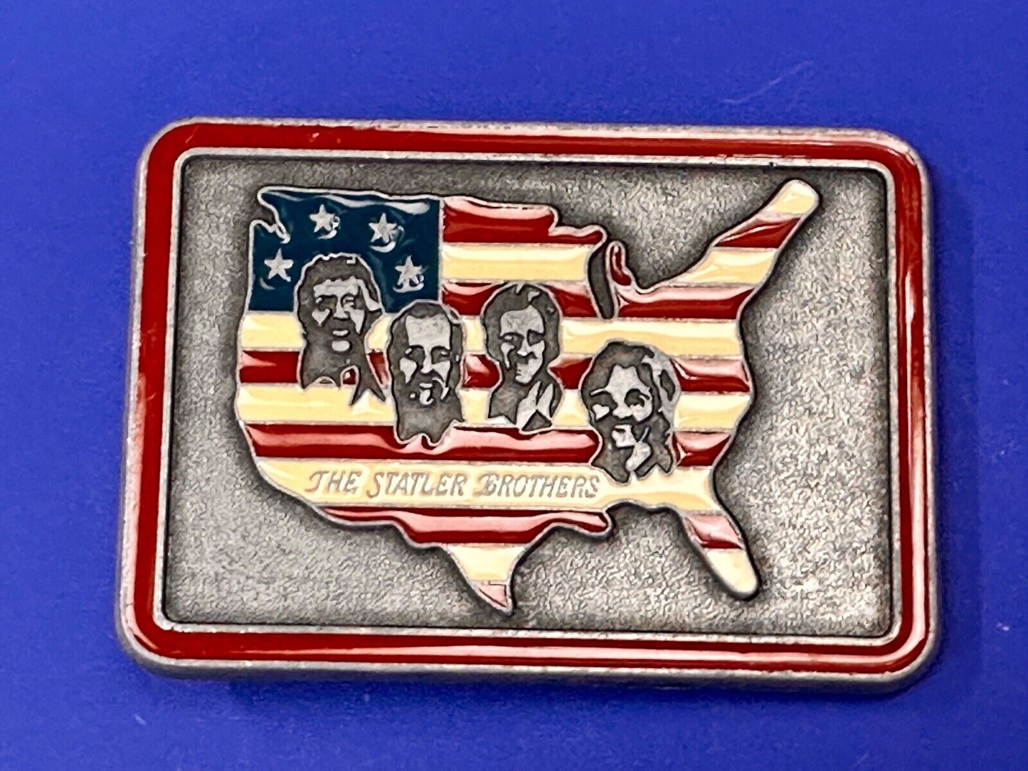 The Statler Brothers American Flag Country Shaped background band belt buckle