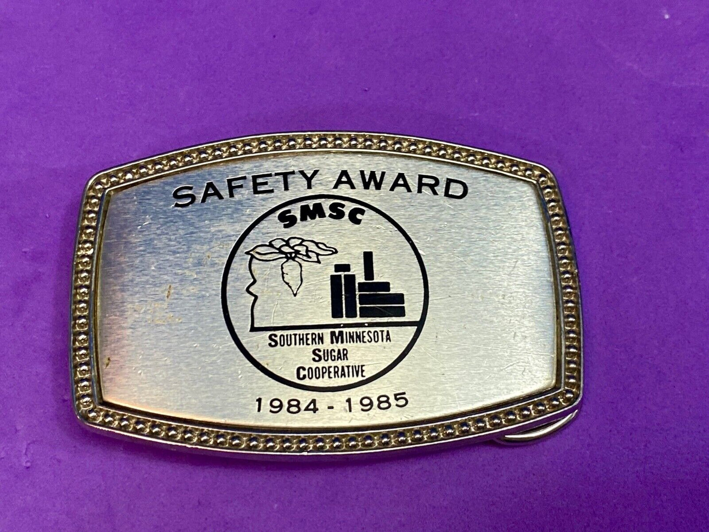 1985 - Smsc Southern Mn Sugar Cooperative Safety Award Belt Buckle By Alumaline