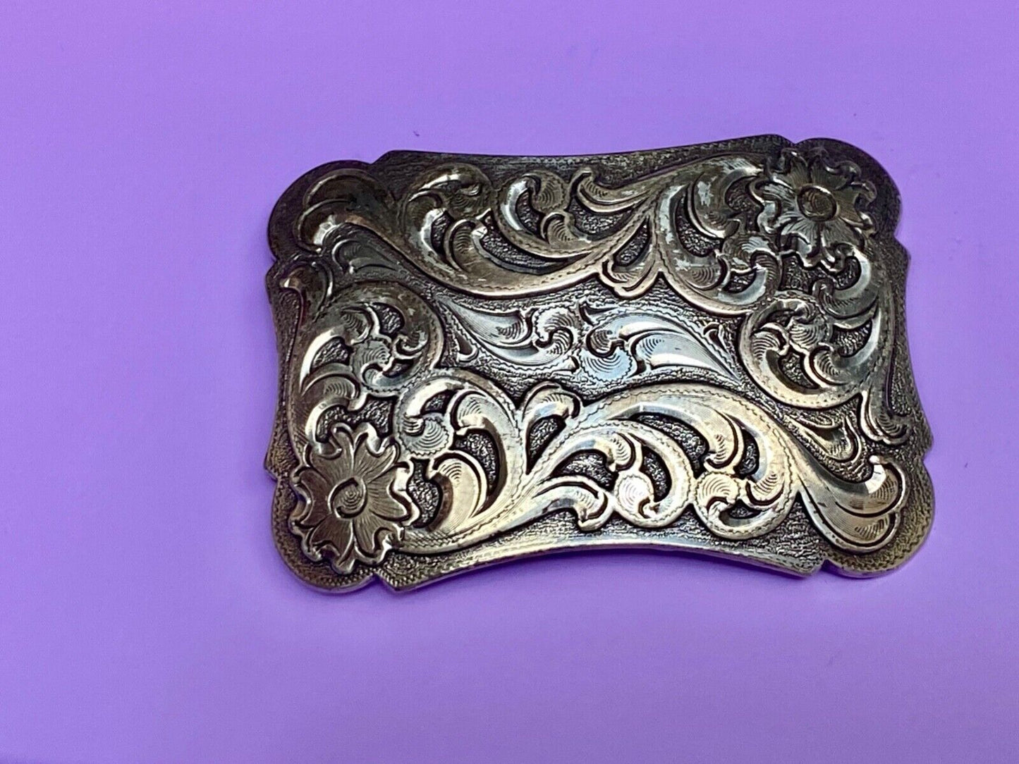 Thick flower swirl silver color western belt buckle