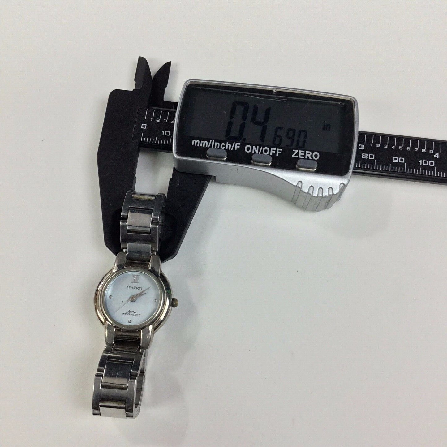 Armitron NOW Silver tone Comes Ladies Round Dress Watch - Working Well