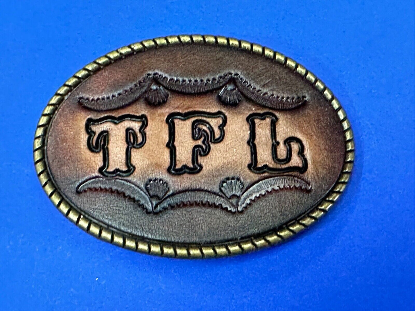 TFL. vintage western initials letters on leather belt buckle