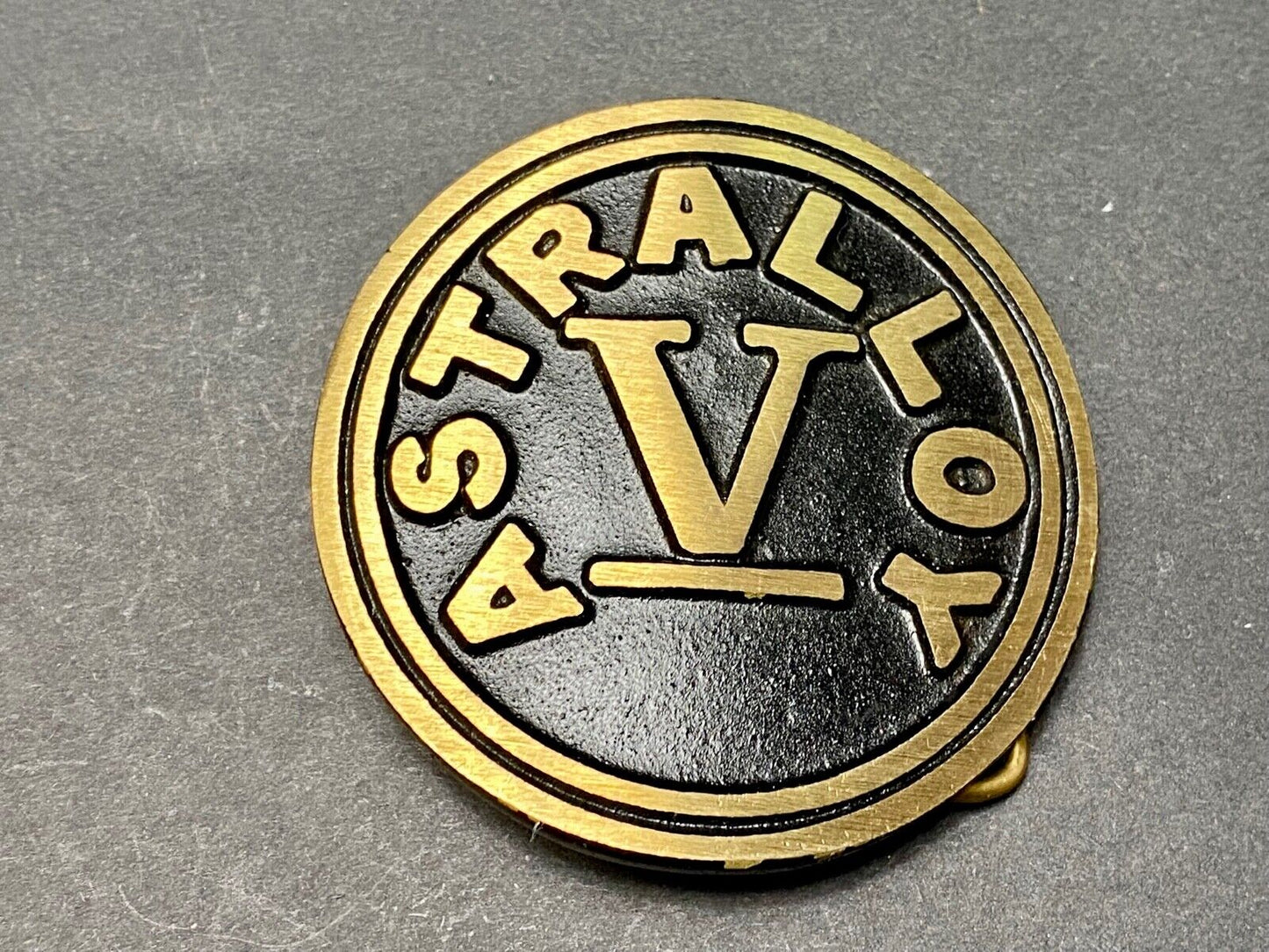 Astralloy Vis a unique, deep-air hardened steel promotional brass belt buckle