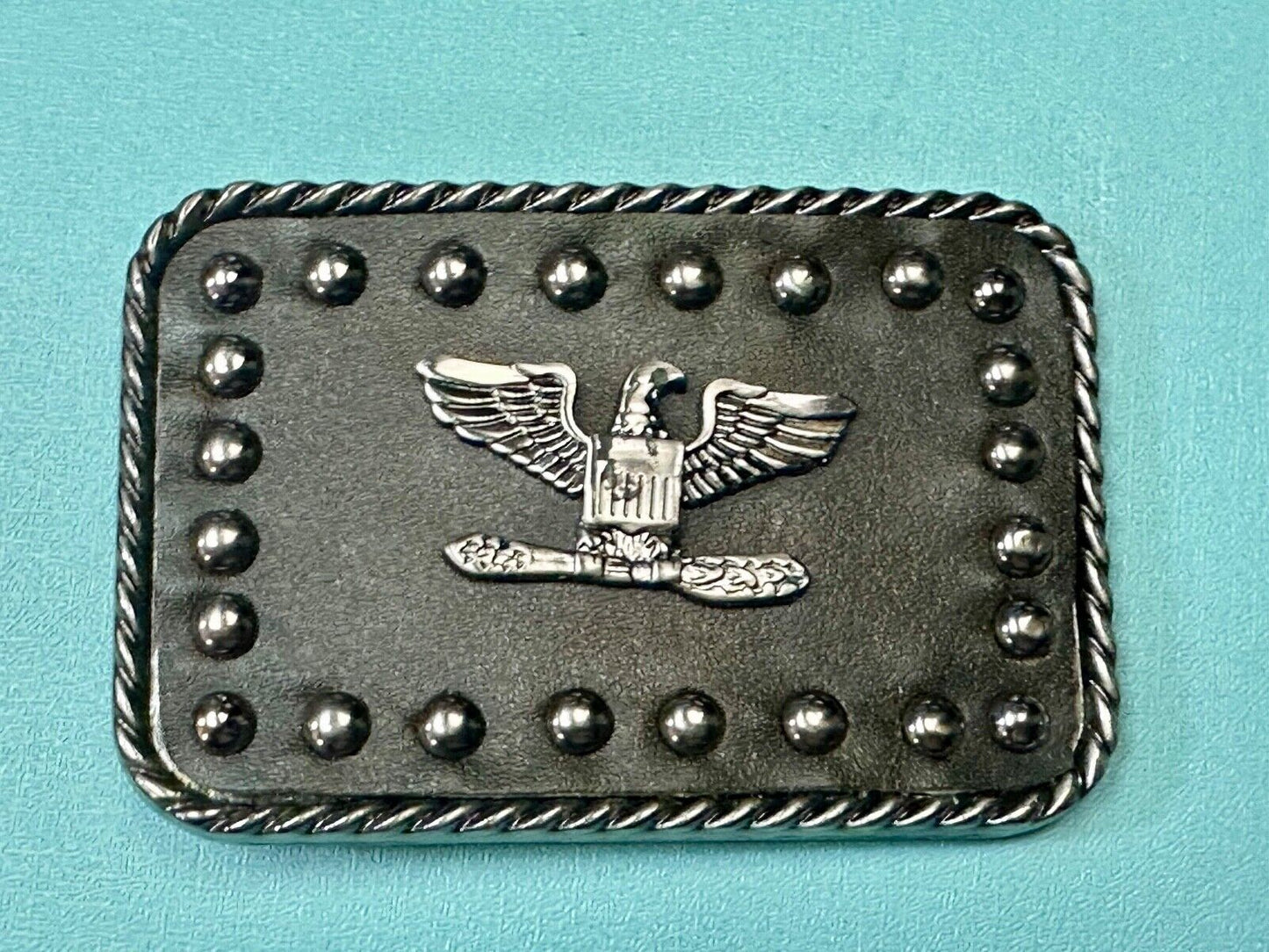 American Eagle - biker style studded black leather background belt buckle