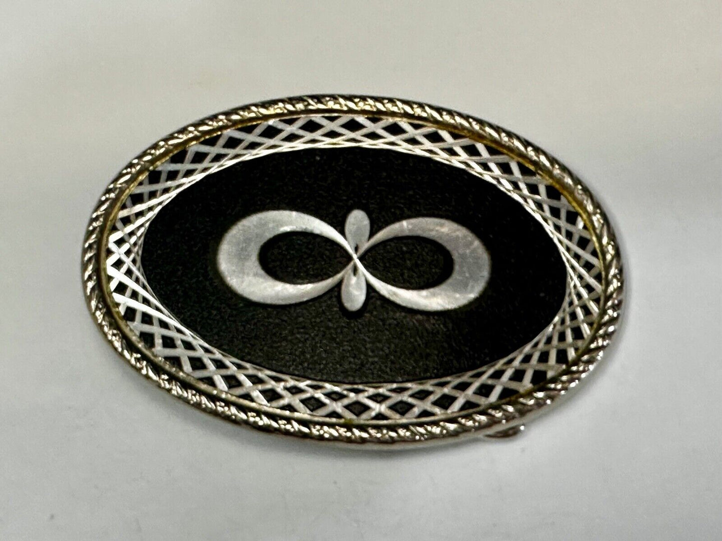 Vintage etched Figure 8 pattern on two tone Black & Silver Belt Buckle