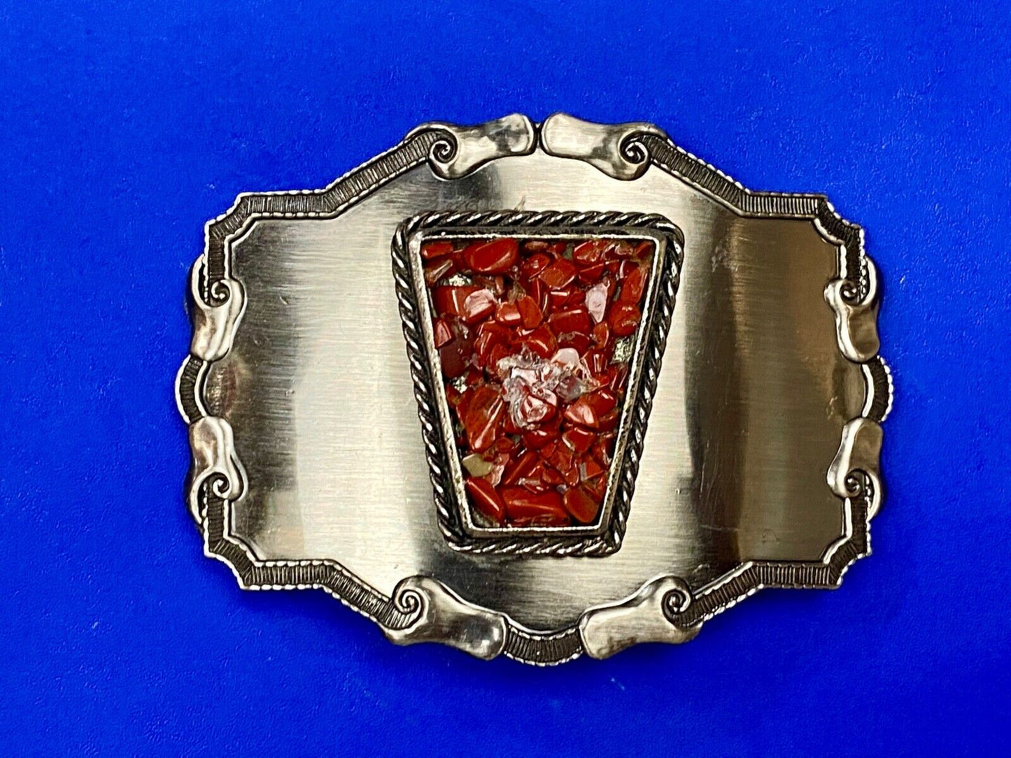 Vintage chunky red stones in centerpiece of Western Thick framed belt buckle