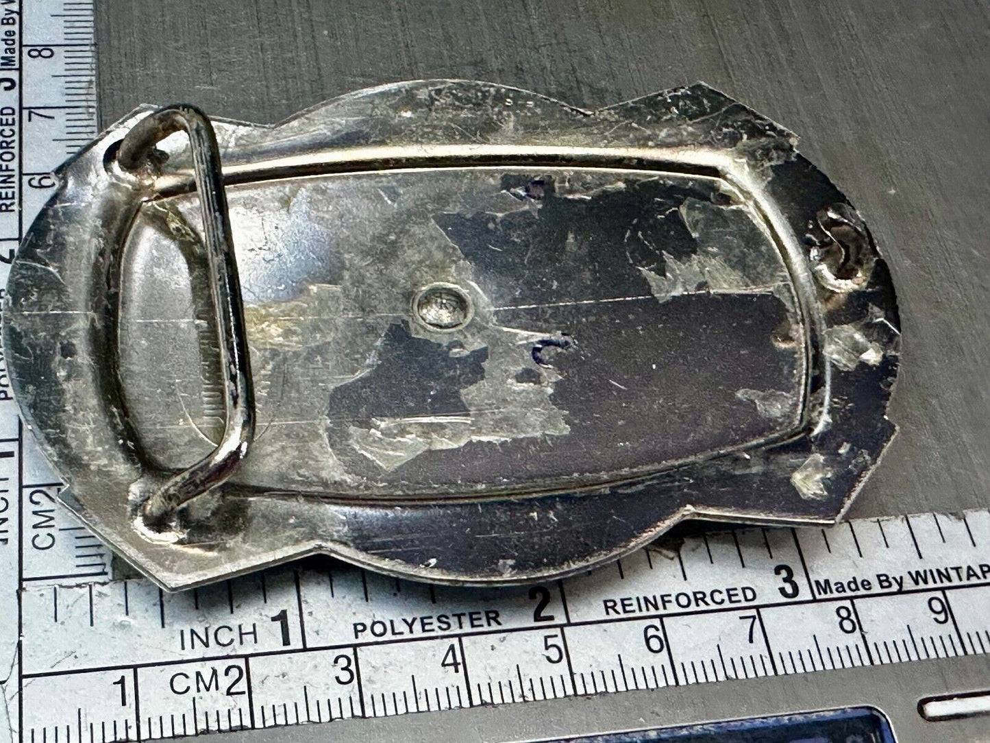 Vintage Cowboy Saddle Bronc on reflective two tone western belt buckle