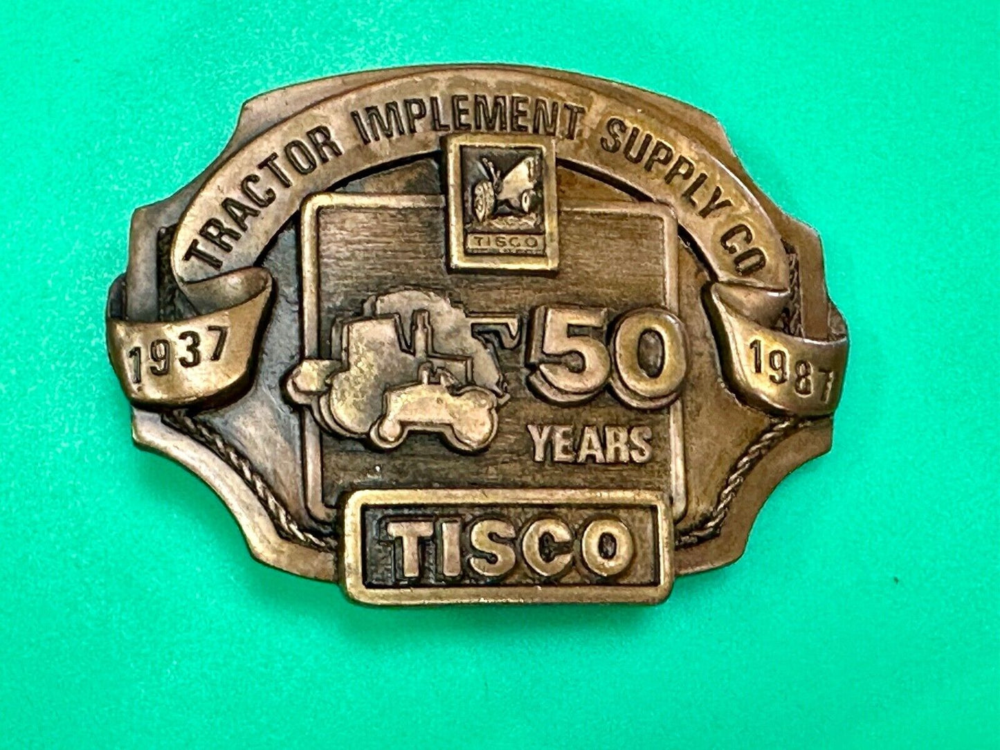 Tisco 50 year celebration Tractor farm supply company promo 1986 belt buckle