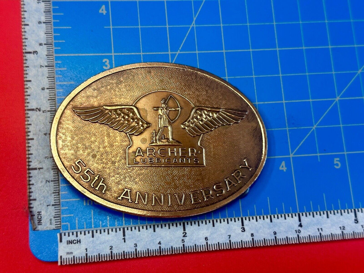 Archer Lubricants Omaha NE - Oil for farmers ranchers belt buckle