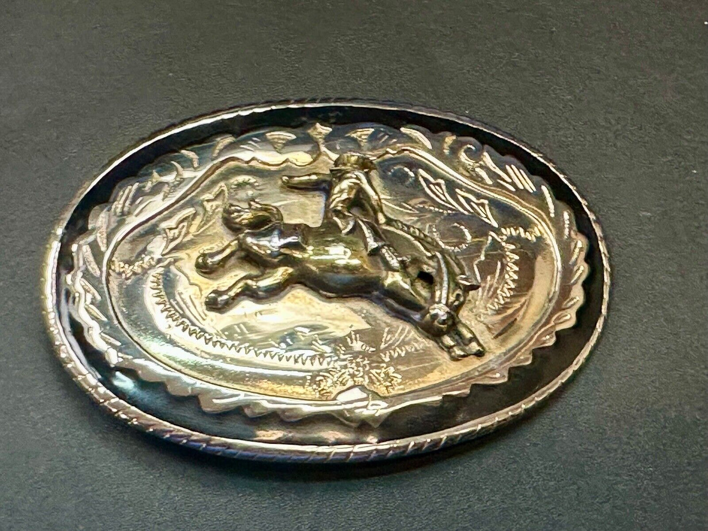 Beautiful Cowboy Saddle Bronc western black silver gold color belt buckle