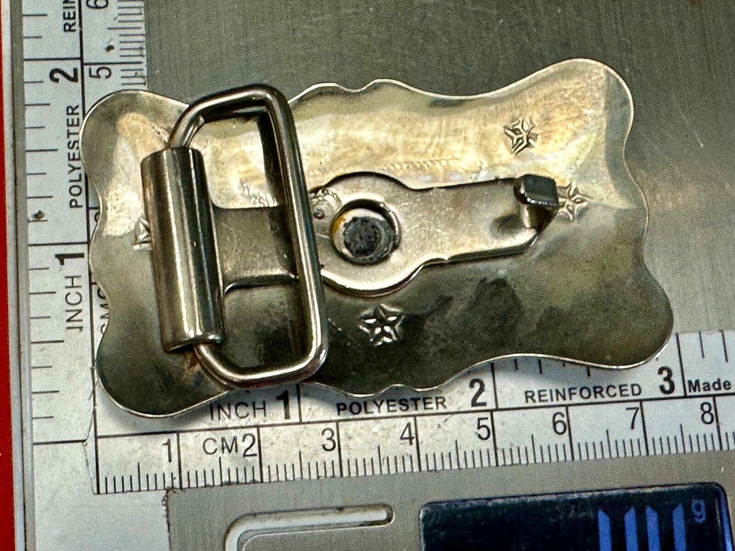 Vintage Cowboy Saddle Bronc western two tone belt buckle with star accents