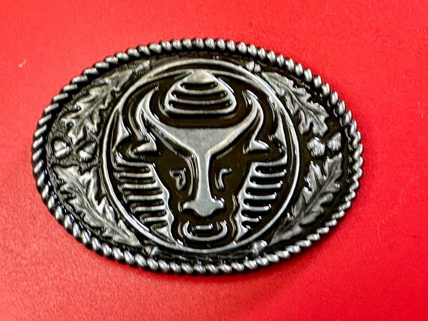 The Longhorn cow steer with nose ring Vintage rope boarder belt buckle